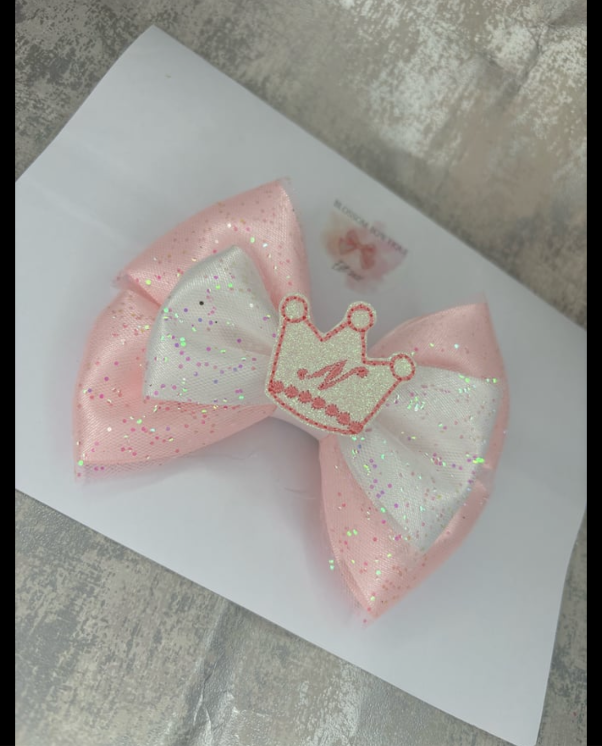 Initial crown Bow